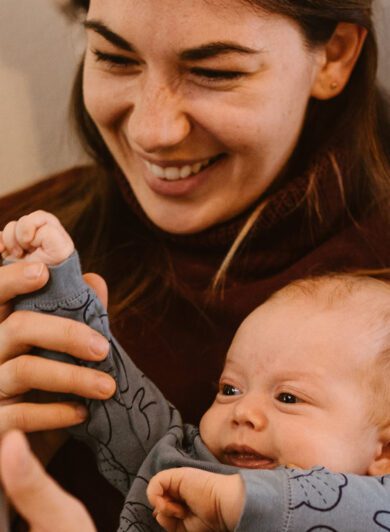 baby and mom watching baby sensory video on tablet